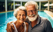 © Bartek - Happy Senior Couple Hugging at the Poolside