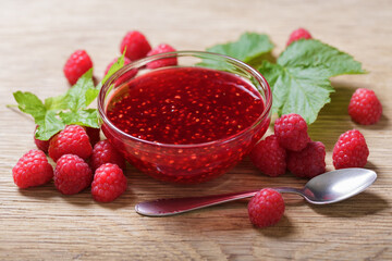 Wall Mural - Bowl of raspberry jam with fresh fruits