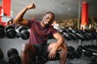 © Serhii - Young athletic African American man in the gym