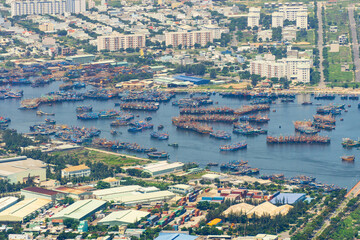 Wall Mural - Distant view of a busy harbour full of ships at Da Nang in Vietnam