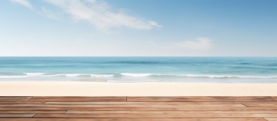 Poster - A wooden table or pier is shown in the presence of a sunny beach and sea in the background. provides an ample amount of space for featuring and promoting your product.