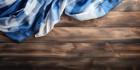 Wall Mural - Rustic background with bavarian white and blue fabric on old wooden plank