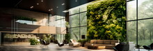 Modern Office Lobby With Sleek Furniture, A Living Green Wall, And Natural Light.