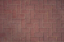 Abstract Background Of Red Tiles On The Track In The Park