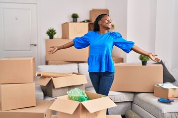 Sticker - African american woman smiling confident standing at new home