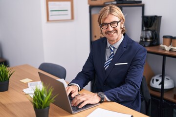 Poster - Young blond man business worker using laptop working at office