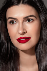  Fashion portrait of caucasian young brunette woman with perfect hair styling and fresh healthy skin