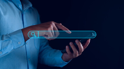 Wall Mural - data search technology engine optimization. businessman hand touch searching icon for information on