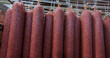 Production of smoked and dried sausages .Industrial meat processing plant.