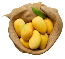 Sticker - Fresh mango tropical fruit in linen cloth, top view