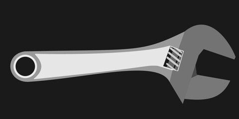 An adjustable wrench isolated on a black background, it  s a type of wrench which can be adjusted according to different settings, to fit for size to a wide range of hexagonal nuts