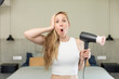 © kues1 - feeling extremely shocked and surprised. hair dryer concept