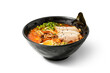 Spicy tonkotsu Ramen with pork in a bowl on white background.