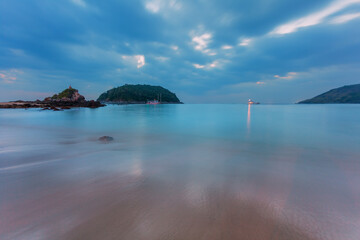 Wall Mural - Tropical beach at sunset.