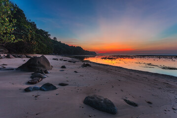 Wall Mural - Tropical beach at sunset.