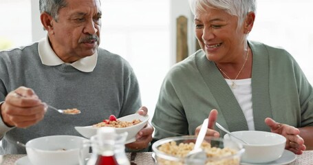 Canvas Print - Breakfast, muesli and morning with old couple at table for food, gratitude and wellness. Love, support and brunch with senior man and woman eating in dining room at home for nutrition and health