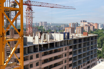  Aerial view of a construction site with the city in the background.