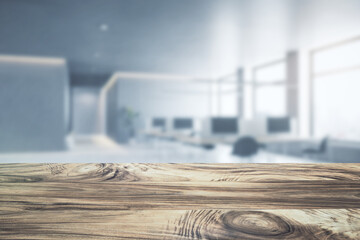 Wall Mural - Close up of empty wooden desktop with product placement mock up place on blurry office interior background. 3D Rendering.