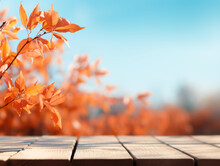 紅葉した枝葉、木製のテーブルに青空の背景フレーム。生成AI