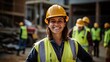 © Fred - Captured on the work site, a female construction worker dons PPE and wears a bright smile