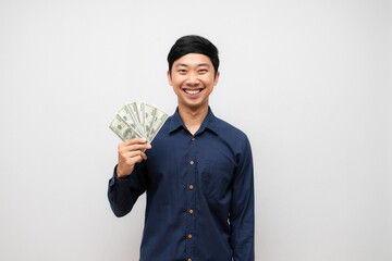 Asian man show earn money in his hand with happy smile isolated