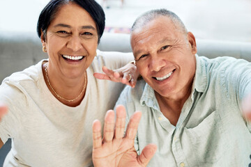 Poster - Mature couple, waving and selfie on home sofa for video call, streaming and internet. A happy man and woman together on a couch for social media profile picture, hello or memory of healthy marriage