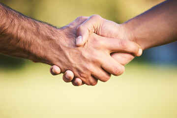 Shaking hands, sports and team collaboration of men, exercise challenge or trust. Handshake, deal and athlete people in welcome, intro or thank you, agreement or partnership, closeup or mockup space