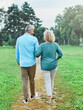 © Lumos sp - woman man mature couple happy together active bonding park outdoor middle aged talking leisure park fun smiling love old middle mid aged nature wife walking