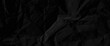© Grave passenger - Texture of black crumpled paper, black crumpled paper texture in low light background,dark paper background with chaotic bends, black wrinkled paper texture.