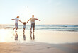 © Davids C/peopleimages.com - Gay parents holding hands with girl at beach running in water on holiday, vacation and adventure. Lgbtq family, sunset and happy child with fathers by ocean for bonding, relaxing and fun outdoors