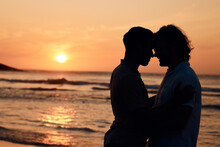 Silhouette, Sunset And Gay Men At Ocean, Love And Mockup On Summer Vacation Together In Thailand. Sunshine, Beach And Romance, Lgbt Couple In Nature Space And Island Holiday With Pride, Sea And Waves