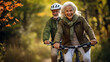 Happy mature couple riding bicycles in park. Active lifestyle.