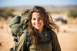 Female Israeli soldier in a desert training  photo with empty space for text 