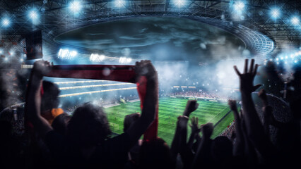 Wall Mural - Football scene at night match with with cheering fans at the stadium