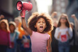 © SnapVault - African American girl leads a protest with a megaphone in hand, The voice of children in the fight against racism