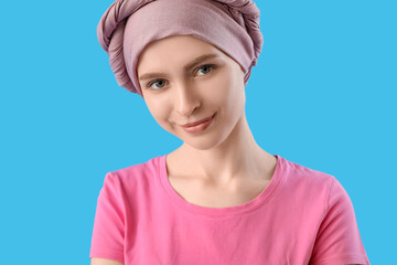 Sticker - Teenage girl after chemotherapy on blue background, closeup