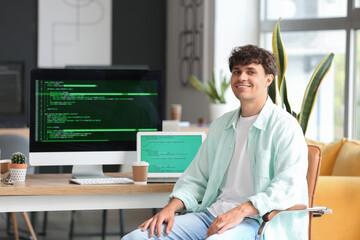 Sticker - Male programmer sitting in office