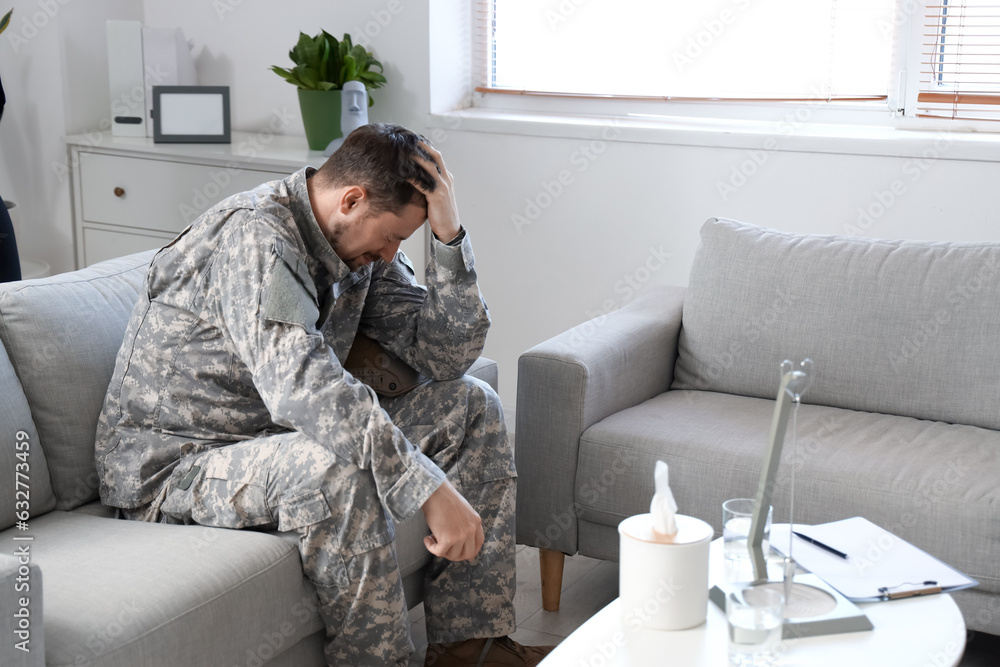 Male soldier crying in psychologist's office