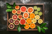 Variety Of Citrus Fruits In Wood Box With Leaves 2