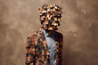 © Surachetsh - a man fragmented into cube-like pieces, forming a mosaic that represents feelings of confusion, suspicion, pressure, and depression experienced. Generative AI.