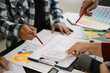 © NINENII - Creative male web designer planning application development for web mobile phone at modern workplace.