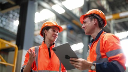 Wall Mural - Railway Transportation Inspector With Engineer Checking and Maintaining part of train in station.