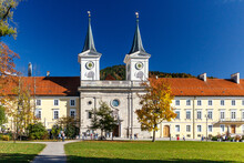 European Building With Two Clock Towers And Spires