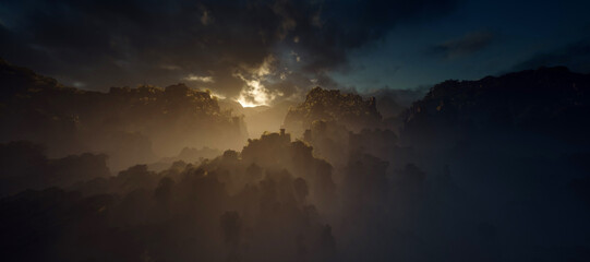 Wall Mural - Misty jungle with rock pillars with cloudy sky at sunset.