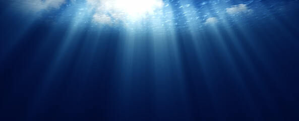 Underwater sun light with beams copy space background.