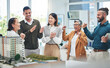 © Azee/peopleimages.com - Business, staff and architecture with achievement, celebration and applause for success, growth and real estate development. Excited group, men and women cheering, property and engineer with model