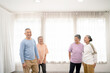 © artitwpd - Active Asian senior group mix with man and woman exercise by dancing together at home with relaxing, smiling and laughing. Indoor activity for mature seniors and retirement people.