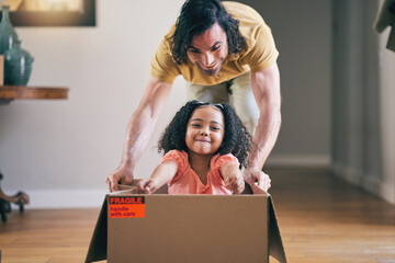 Poster - Father, kid and box in new house for games, fun and energy for bonding in real estate apartment. Happy dad, girl child and interracial family play with cardboard boxes for race while moving to home