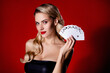 Photo of cunning lady bluff show poker cards full house winner victory in casino on red background