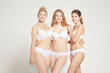 © Connect Images - Young women posing in underwear, real women
